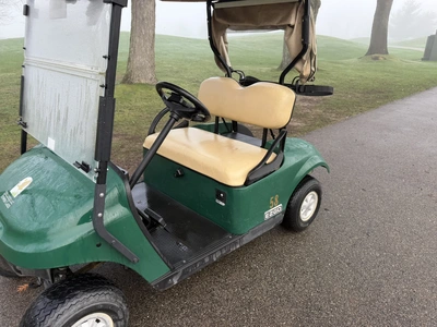 (1) 2017 E-Z-Go golf cart with a Kawasaki gas engine, model 625111G01, includes canopy, ball cover, ...