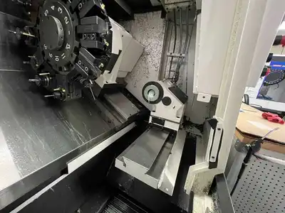 2021 OKUMA GENOS L3000-E Lathes, Bar, CNC | Machnet (14)