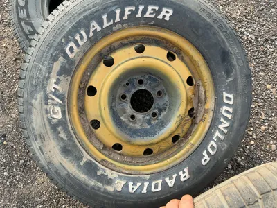 Lot of (1) General Size 205/65R15 Tire on Steel 5-lug Wheel, (1) General 185/60R15 Tire on Steel 5-l...
