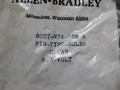 Box of 18 Allen Bradley 800T-N34 Clear Pin Type Bulbs 6.3V Series A New
