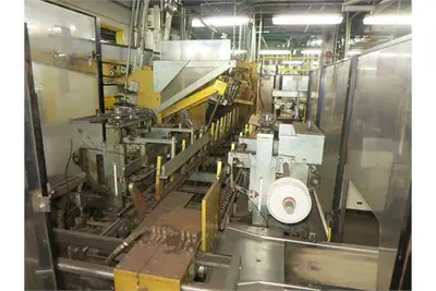 Douglas Machine tray packer with bottom/top magazine hopper 460V