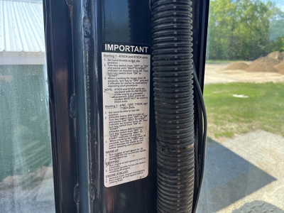 USED 2004 JOHN DEERE 670C SERIES 2