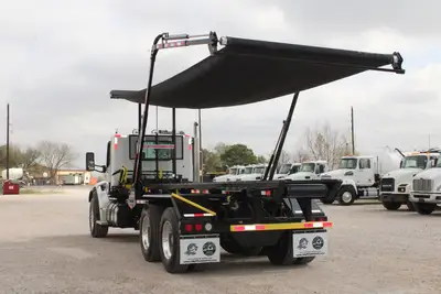 New | in-Stock 2027 PETERBILT 548 Rolloff Trucks Texas US | Roll Off Truck World #1492003