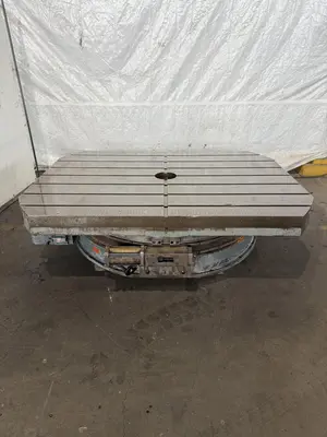 84" X 60" STONE CO ROTARY TABLE. STOCK # 1120524