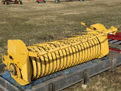 (1) approx. 5' wide pickup unit for a hay baler, unit has some damage, is listed for parts or repair...