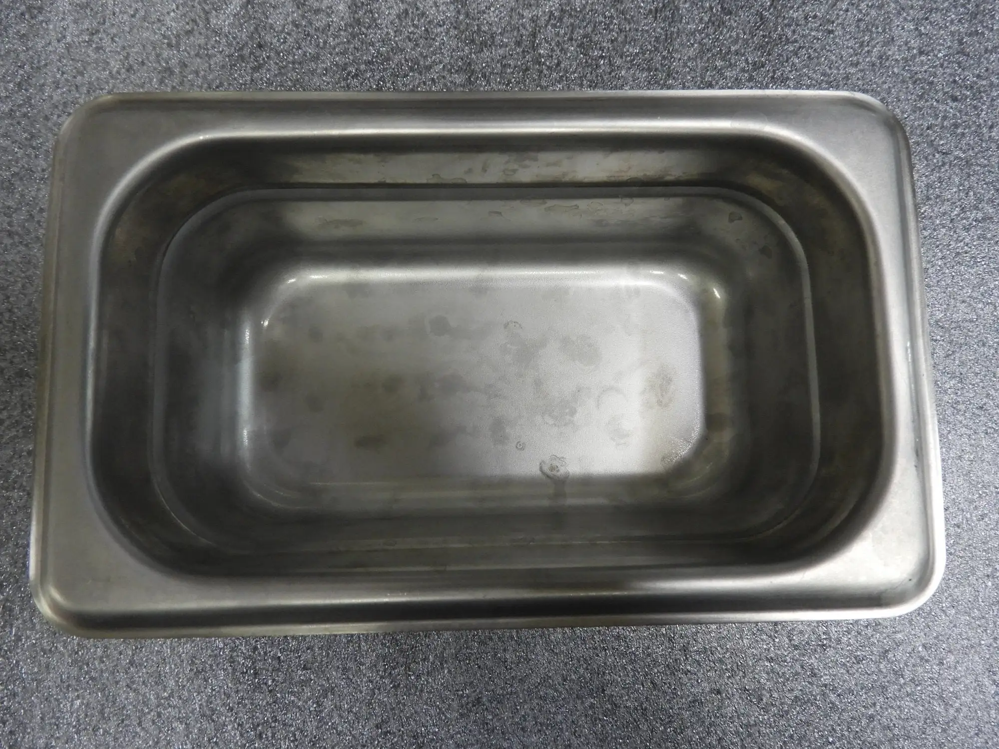 Used Isaac Peoria Used Winco SPJL-902 1/9 Size Anti-Jam Stainless Steel Steam Table Food Pan C IP Steam Pans Illinois US | Falcon Restaurant Supply #1376562