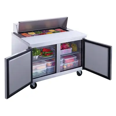 New | in-Stock Dukers New Dukers DSP48-12-S2 2-Door Commercial Food Prep Table Refrigerated in Stainless Steel Food Prep Tables Illinois US | Falcon Restaurant Supply #1376290
