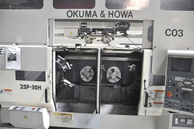 USED OKUMA 2SP-30H TWIN SPINDLE CNC + GANTRY ROBOT