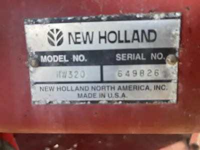 USED 1997 NEW HOLLAND HW320