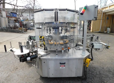 USED QUADREL DUAL SIDE LABELER ROTARY