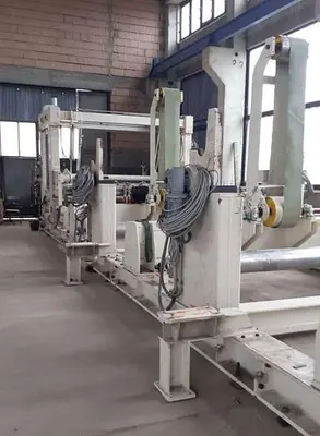USED 2001 TOSCHI TWO DRUM TISSUE SLITTER REWINDER