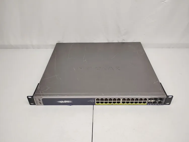 Used Netgear GSM7228PS Network Switches US | Sporadic Surplus LLC #1063944