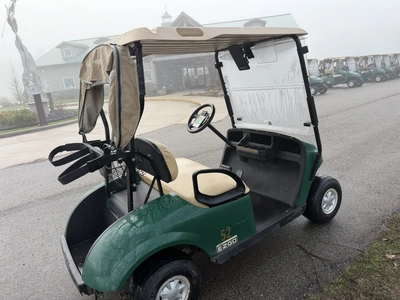 (1) 2017 E-Z-Go golf cart with a Kawasaki gas engine, model 625111G01, includes canopy, ball cover, ...