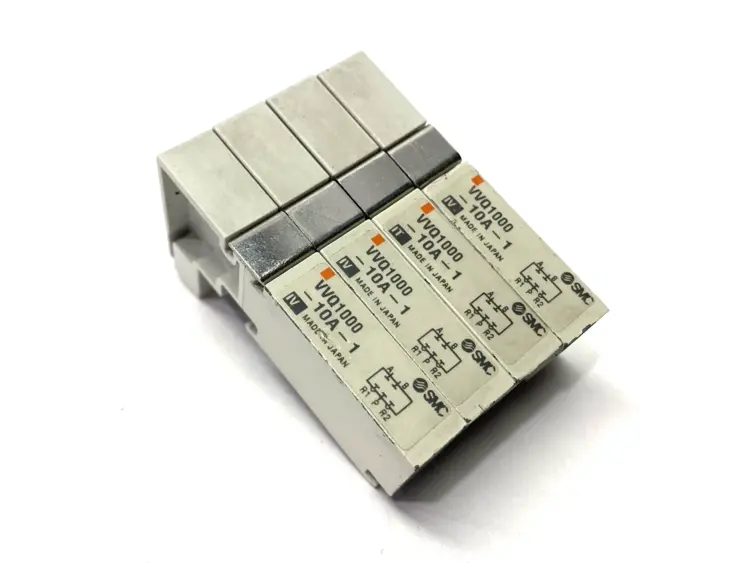 Used SMC PNEUMATIC BLANKING PLATE VALVE MANIFOLD LOT OF 4 Valves/Fittings | Maverick Industrial Sales #1106091