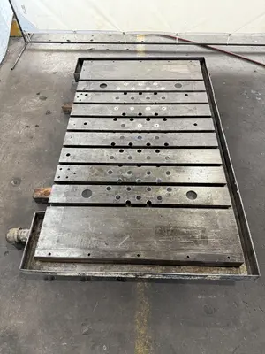 42" WIDE X 72" LONG X 6" THICK T-SLOTTED BOLSTER PLATE. STOCK # 1006324