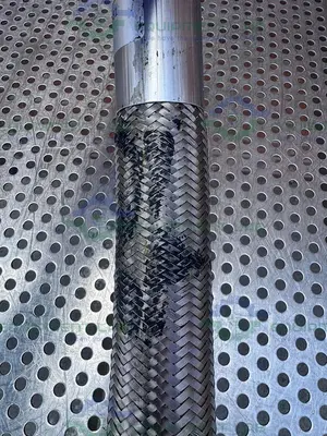 USED HARRINGTON STAINLESS STEEL BRAIDED HOSE 15" W/ 1 1/2" SANITARY FITTING