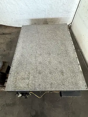 71" X 53" X 12" TRU-STONE GRANITE SURFACE TABLE W/ VIBRATION ISOLATION SYSTEM. STOCK # 0449925.
