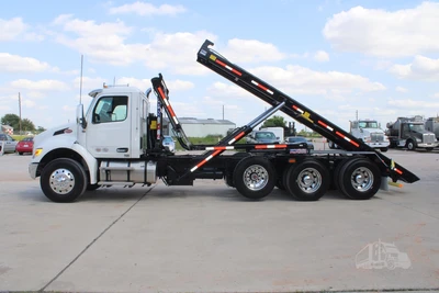 New | in-Stock 2027 PETERBILT 548 Rolloff Trucks Texas US | Roll Off Truck World #1492013