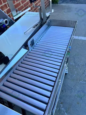 USED DORNER STAINLESS STEEL CONVEYOR INSPECTION MACHINE W/ OPTEL CONTROLLER