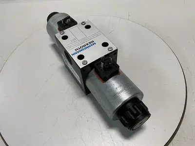 USED REXROTH 4WE10E67-31/CG24N9Z4/T08