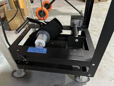 Advent model 310 semi-automatic pressure sensitive wraparound labeler