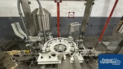 USED Capmatic Capmatic Bottle Filling Line