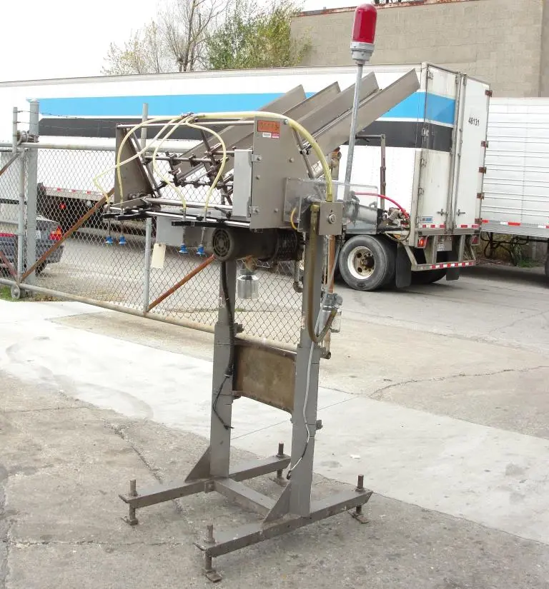 SPC9388  Labeling equipment Thiele Engineering Co. reciprocating placer model 208 RECIP PLACER, 60 coupons per minute