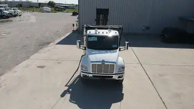 New | in-Stock 2027 PETERBILT 548 Rolloff Trucks Texas US | Roll Off Truck World #1492012