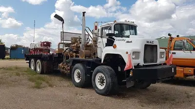 USED 1980 MACK DM600 TWIN STEER HEAVY DUTY OILFIELD PUMP / KILL TRUCK
