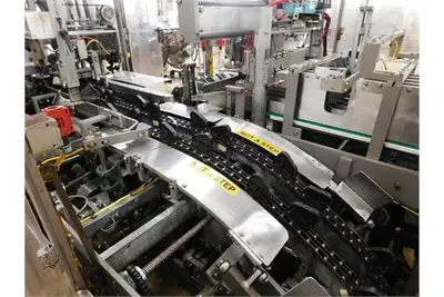 Douglas case packer with controls and magazine