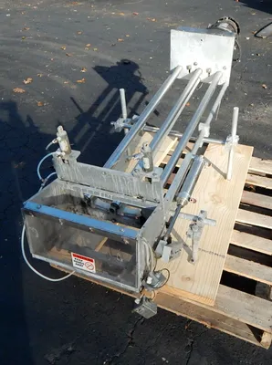 USED LID MAGAZINE PLACER 48 INCH LONG