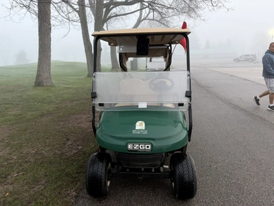 (1) 2017 E-Z-Go golf cart with a Kawasaki gas engine, model 625111G01, includes canopy, ball cover, ...
