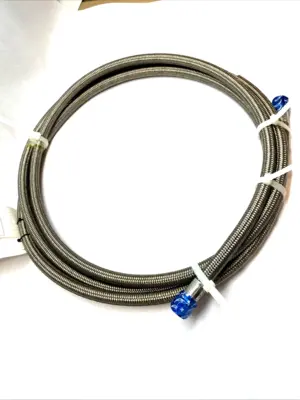 USED GRACO STAINLESS STEEL BRAIDED PTFE HOSE, 4000 PSI JIC 12 COUPLED