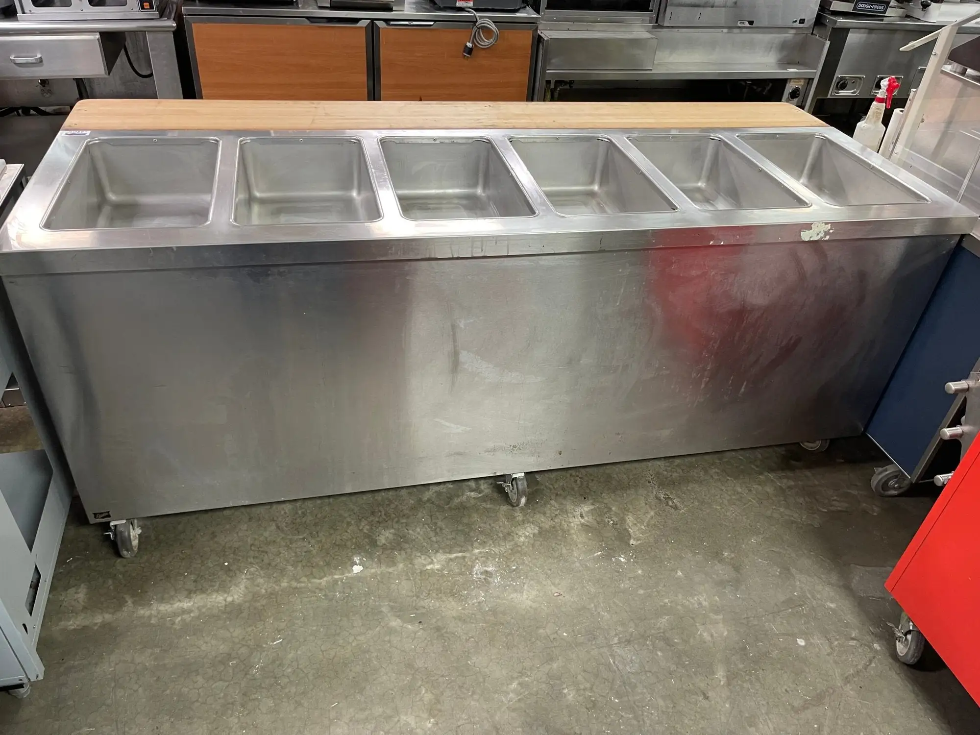 Used Duke Used Duke E-6-CBSS_208/60/1 Thurmaduke Steam Table w/ 6 Wells & Undershelf, 240v Steam Tables (Food) Illinois US | Falcon Restaurant Supply #1376346