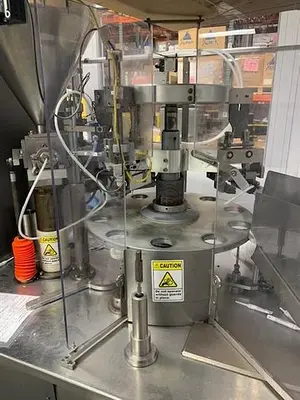 Prodo-Pak model T-60 tube filler