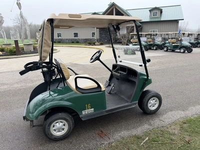 (1) 2015 E-Z-Go golf cart with a Kawasaki gas engine, includes ball washer and Club canopy, ball cov...
