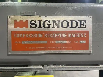 Signode 2 head Unitizer,  in operation