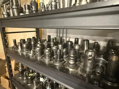 150PC CNC TOOLING LOT: CAT40/50, BT40/50, HSK63, COLLET, END MILL, SHRINK-FIT, BORING HEADS