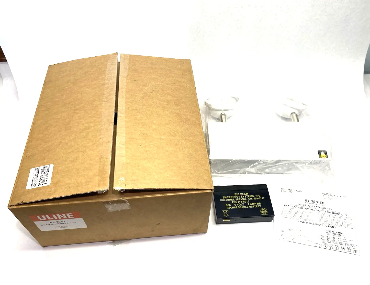 USED ULINE STEEL LED EMERGENCY LIGHT, WHITE, W/ BATTERY
