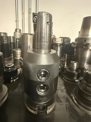 150PC CNC TOOLING LOT: CAT40/50, BT40/50, HSK63, COLLET, END MILL, SHRINK-FIT, BORING HEADS