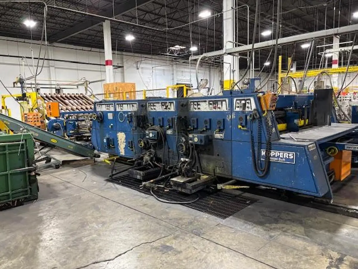 66" x 115" Koppers 2 color Rotary Die Cutter with Slotting section