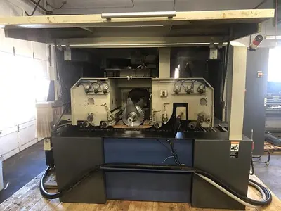 WEINIG RAIMANN PROFIRIP KR-310-M GANG RIPSAW WITH (2) MOVING BLADES WITH RAIMANN VALUE RIP IV GANG RIPSAW INFEED SYSTEM