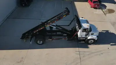 New | in-Stock 2025 MACK MD6 Hooklifts & Roll-Offs Texas US | Roll Off Truck World #1491908