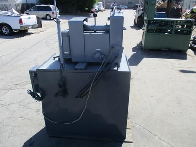 Struers / Discotom Metallurgical Saw with Coolant Pump