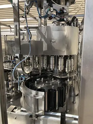 USED 2014 ZHANG J IAGANG, BEIJING CHINA TRI-BLOCK 40 VALVE BOTTLE RINSER, FILLER, CAPPER