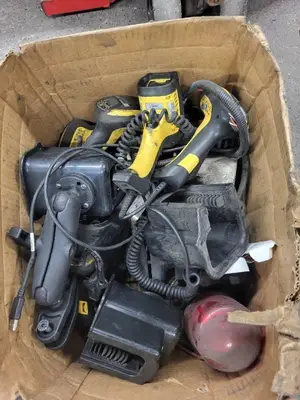 Box of Used Industrial Barcode Scanners and Automotive Parts
