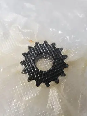 715-011125-001 SPROCKET IDLER (MODIFICATION)