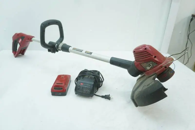 Toro Cordless Weed Trimmer with Charging Block and Battery