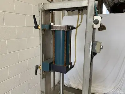 Pneumatic Press on Chain Conveyor
