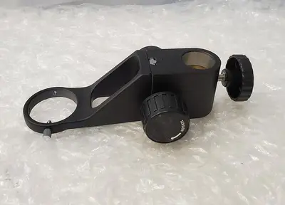 MICROSCOPE FOCUSING MOUNT